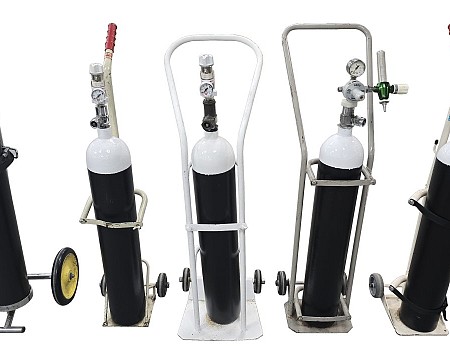 Group Of Period Oxygen Tanks With Trolley (Priced Seperately)