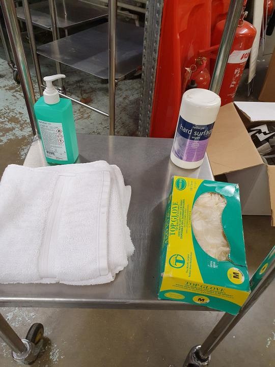 trolley dressing towels box of gloves wet wipes and sanitizer  
