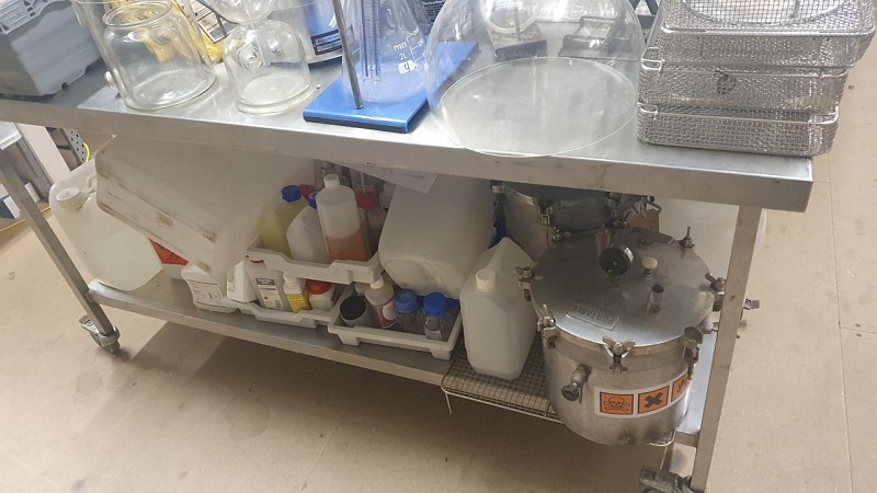 crate of lab bottles qty