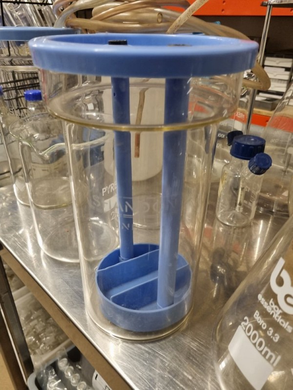 blue plastic lid glass measure 