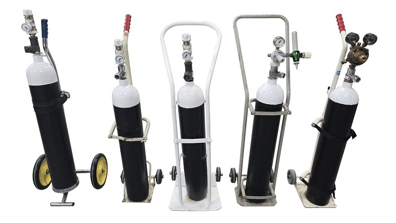 Group Of Period Oxygen Tanks With Trolley (Priced Seperately)