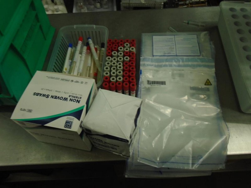 evidence bags swabs yellow bin bags and red + vacutainers 