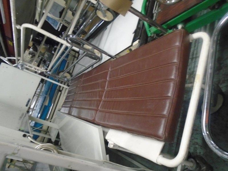 Cream Patient trolley brown mattress 