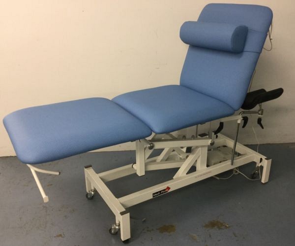 Examination couch Height Adjustable